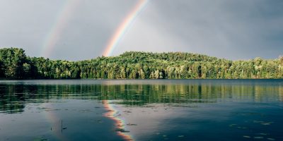 rainbow behind an island